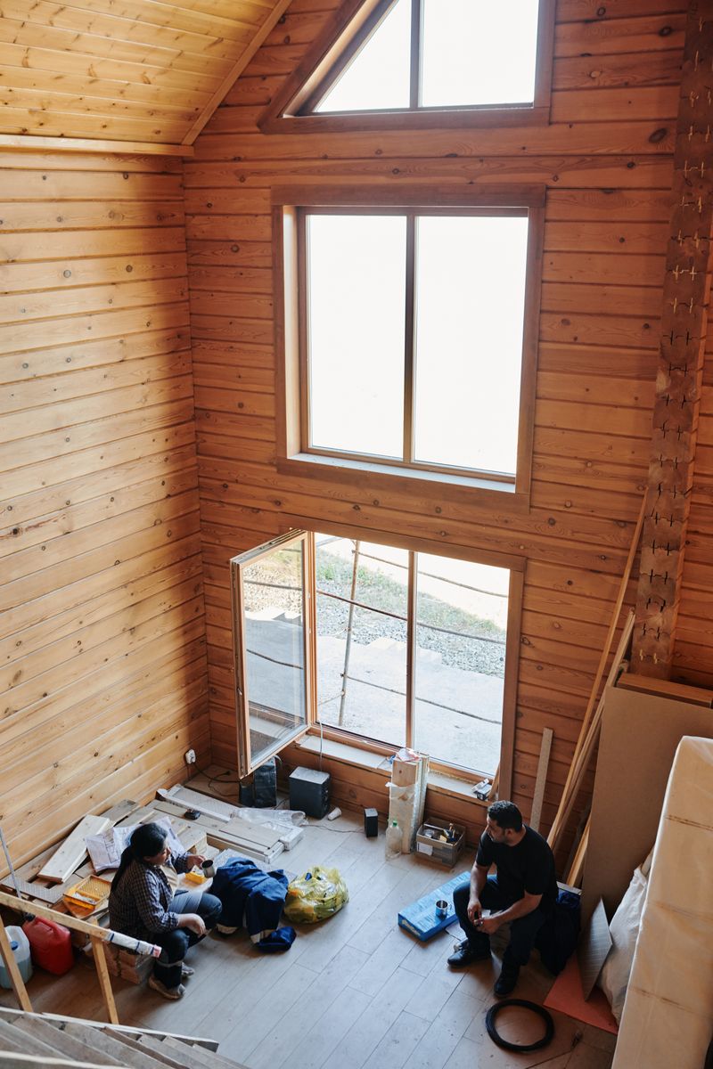 Restoration crew renovating a home interior